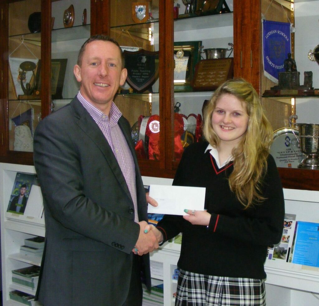 Deputy Principal, Sean Mc Grath presenting Jade Halion with her prize for her design which was chosen to represent the school in the perpetual CEIST award competition