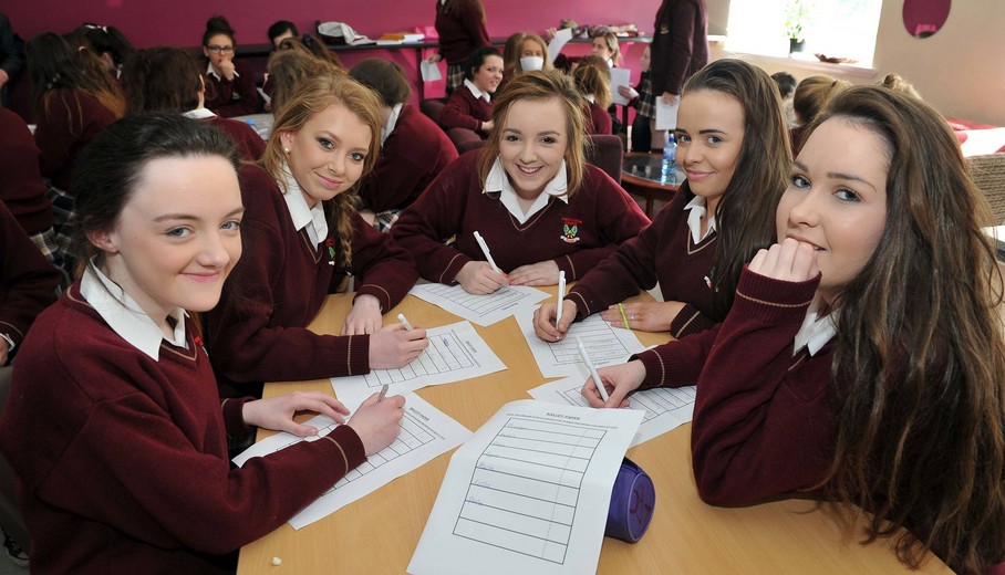 The girls considering their voting choices during the Pop Politics workshop