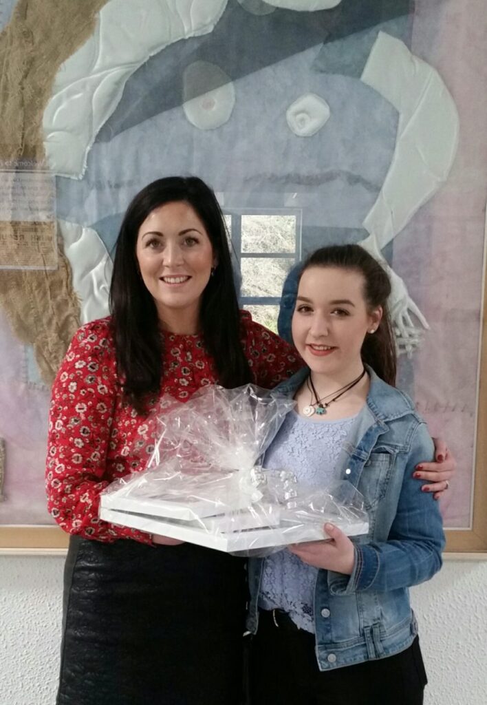 Past pupil Siofra Holyland and 2015 winner of the Maria Quinn Hogan award ...presents the school with her art work . Siofra is currently in first year of Crawford College of Art Cork. What a fantastic gift and surprise